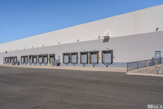 a white building with a street