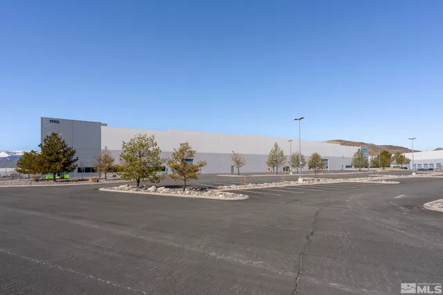 a view of a city street with a building