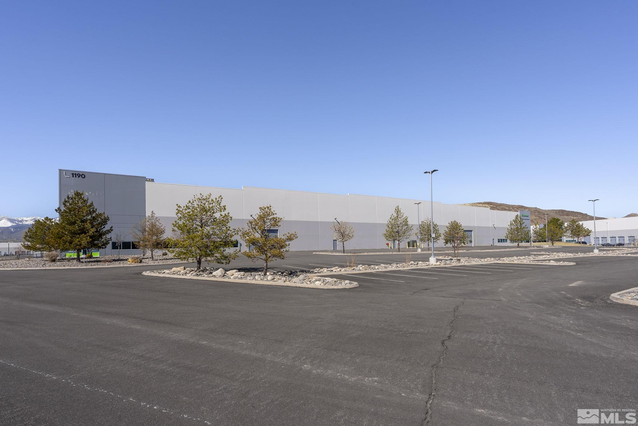 1190 Trademark Drive, Unit 108 108 Reno, NV 89521 - Photo 4 of 20 a view of a city street with a building