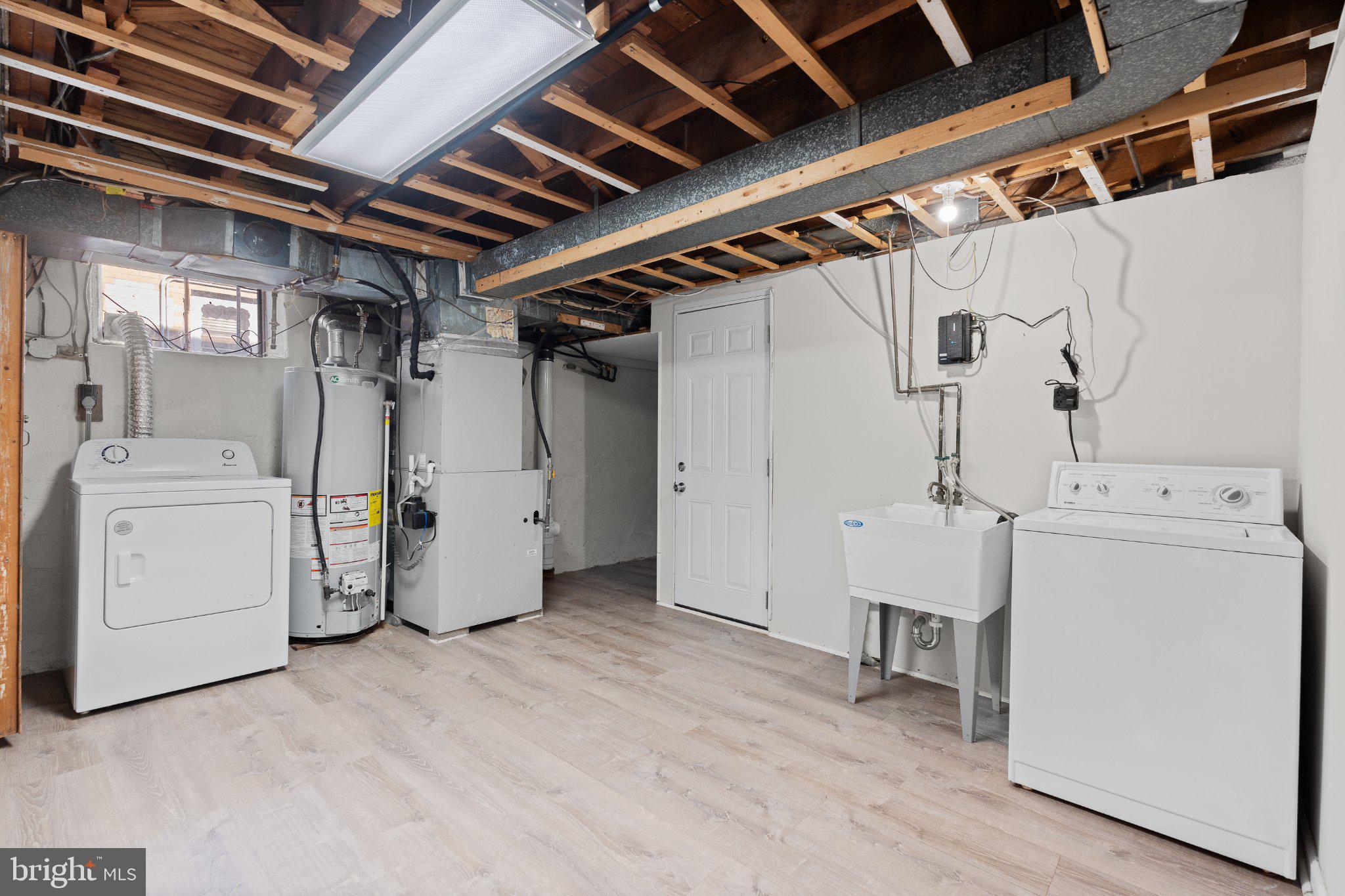 205 Juniper Road, Unit 288 Havertown, PA 19083 - Photo 27 of 28 Bright and spacious laundry area.