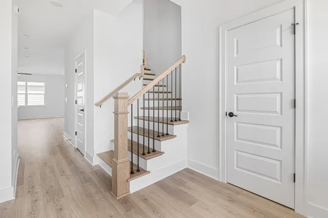 a view of entryway with wooden floor