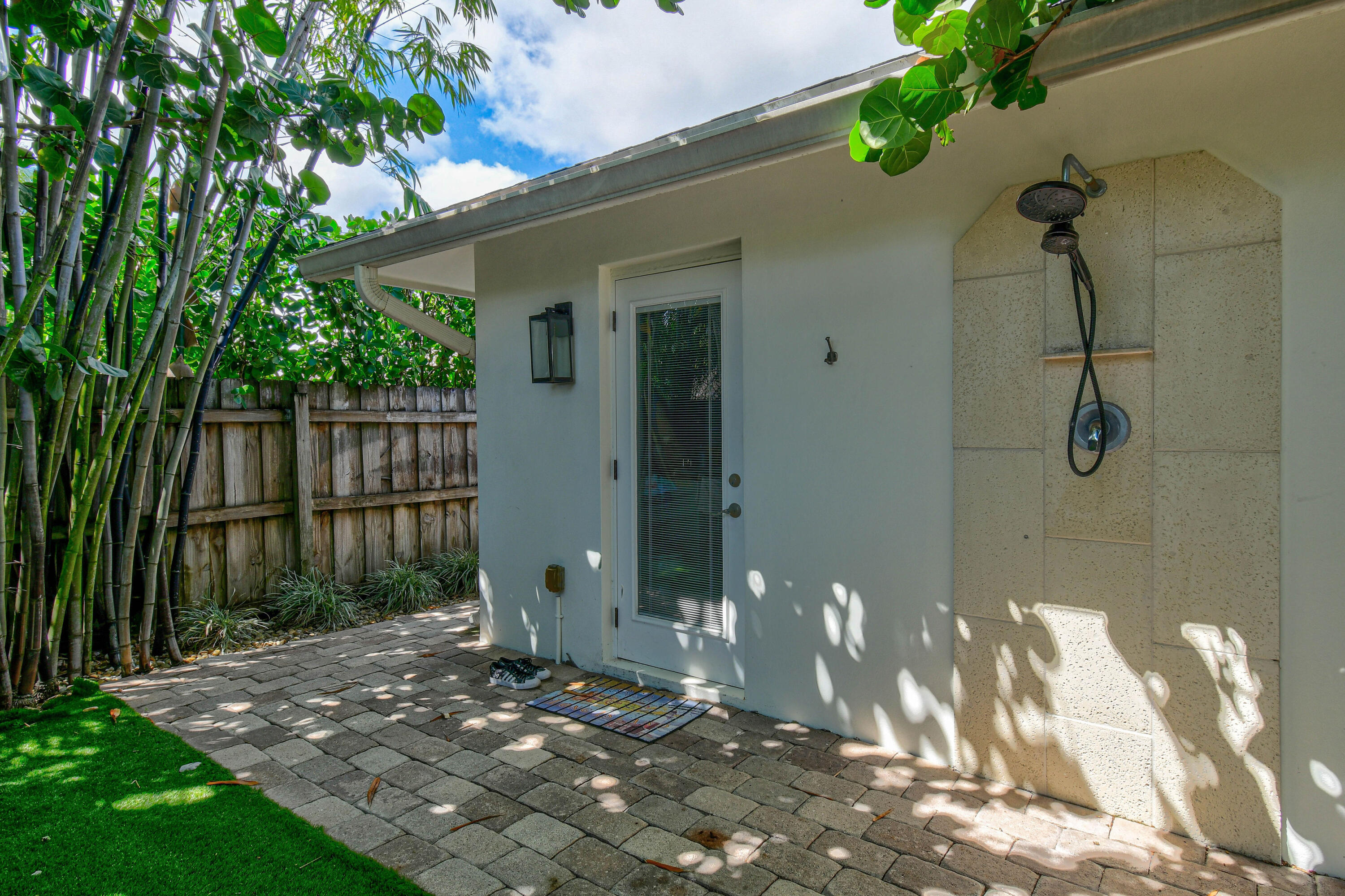 106 Windsor Road East Jupiter, FL 33469 - Photo 37 of 44 Backyard/outdoor shower