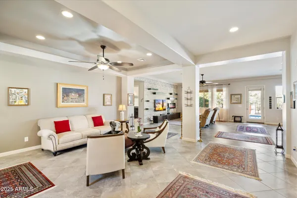 a living room with furniture and rug