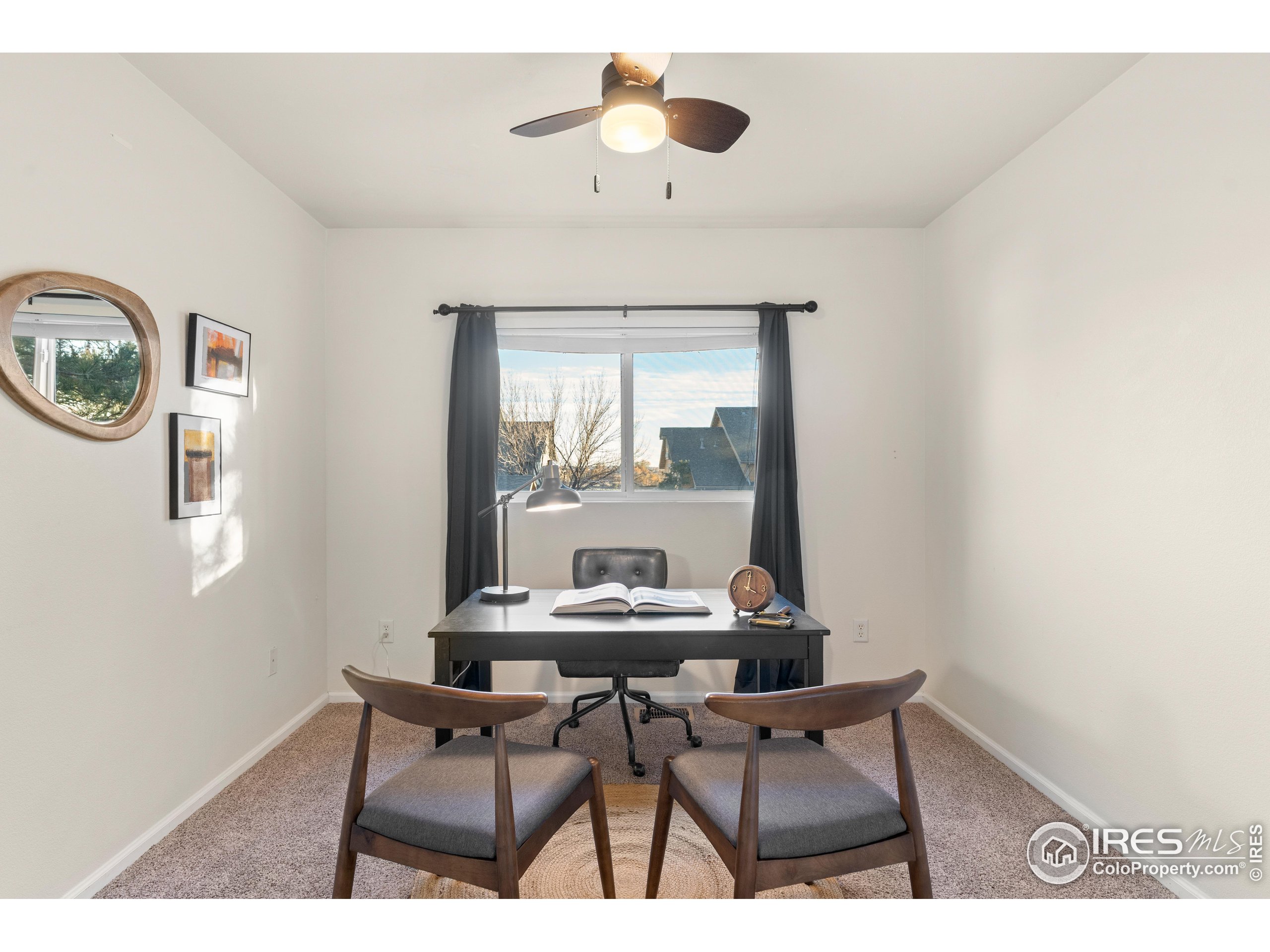 2900 Purcell Street, Unit O4 Brighton, CO 80601 - Photo 6 of 28 a dining room with furniture and a window