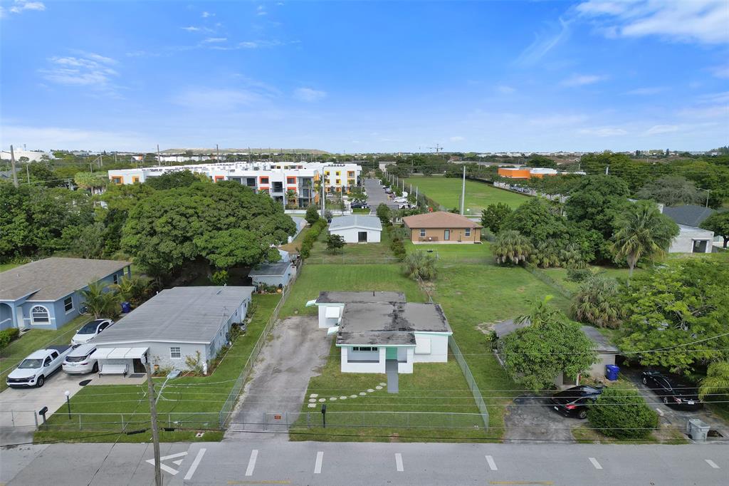 2055 Northwest 8th Street Pompano Beach, FL 33069 - Photo 17 of 20 an aerial view of a house with a garden