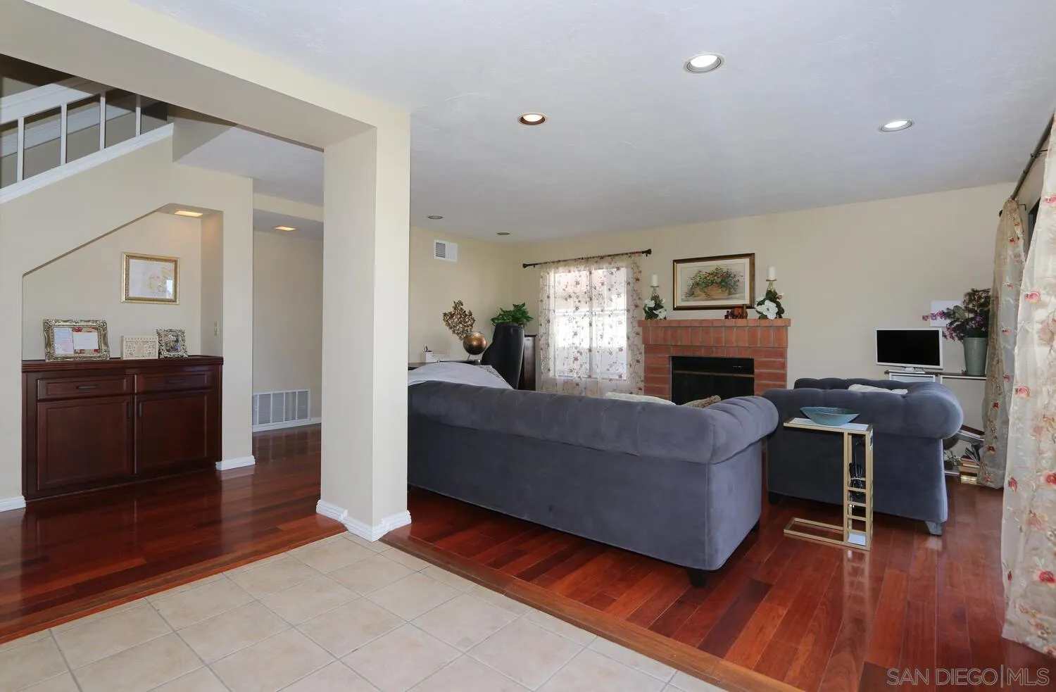13375 Roxton Circle San Diego, CA 92130 - Photo 15 of 29 a living room with furniture and a fireplace