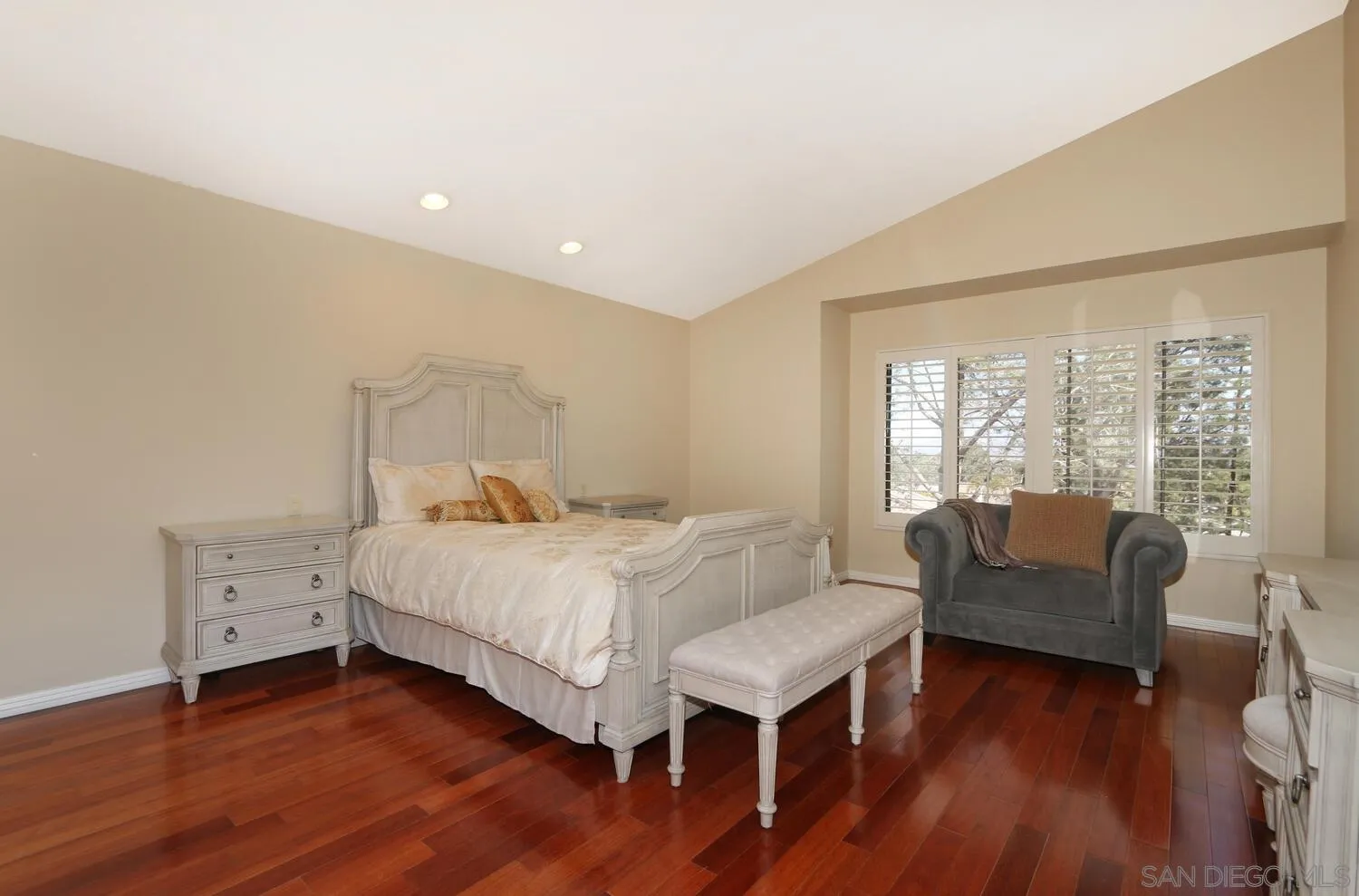 13375 Roxton Circle San Diego, CA 92130 - Photo 16 of 29 a bed room with a bed and a couch