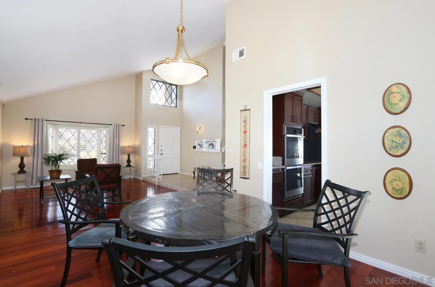 13375 Roxton Circle San Diego, CA 92130 - Photo 9 of 29 a dining room with furniture and window