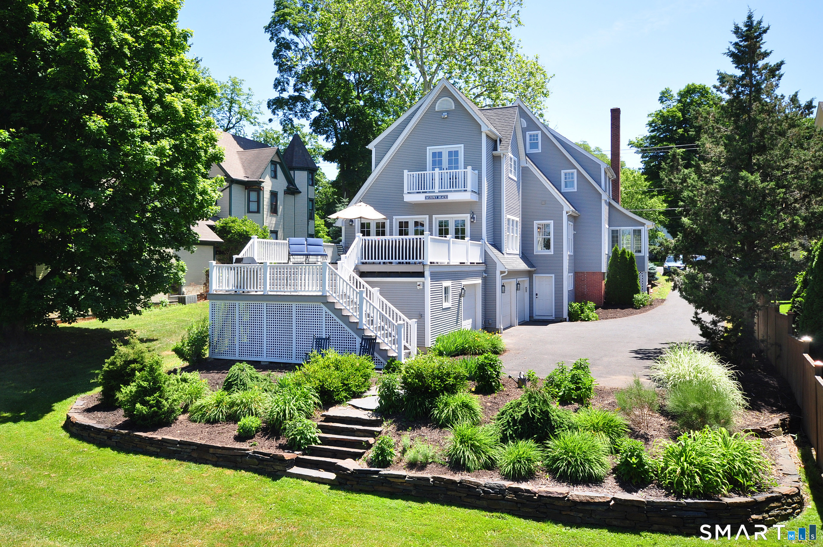371 North Main Street Suffield, CT 06078 - Photo 2 of 39 a front view of a house with a yard