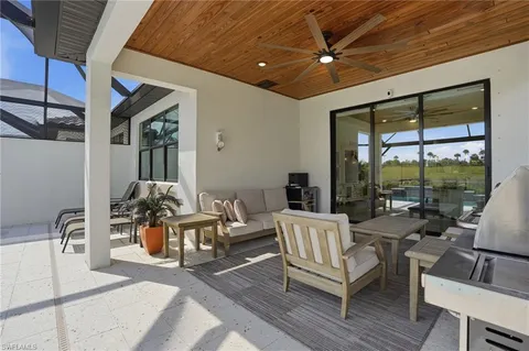 a view of swimming pool with a yard