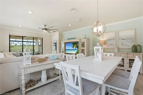 a view of dining table and chairs