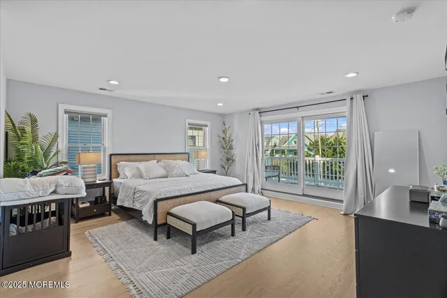 a bathroom with double sink and a mirror