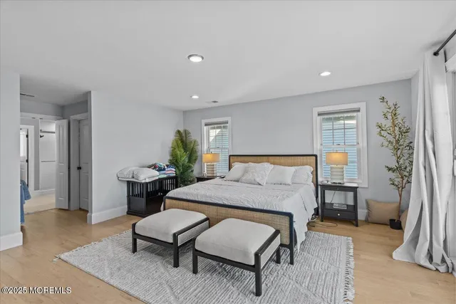 a bathroom with a tub and shower