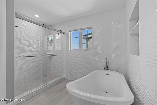 a living room with furniture and a clock