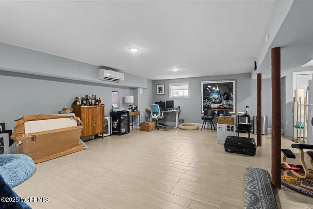 a swimming pool with barbeque oven in front of it