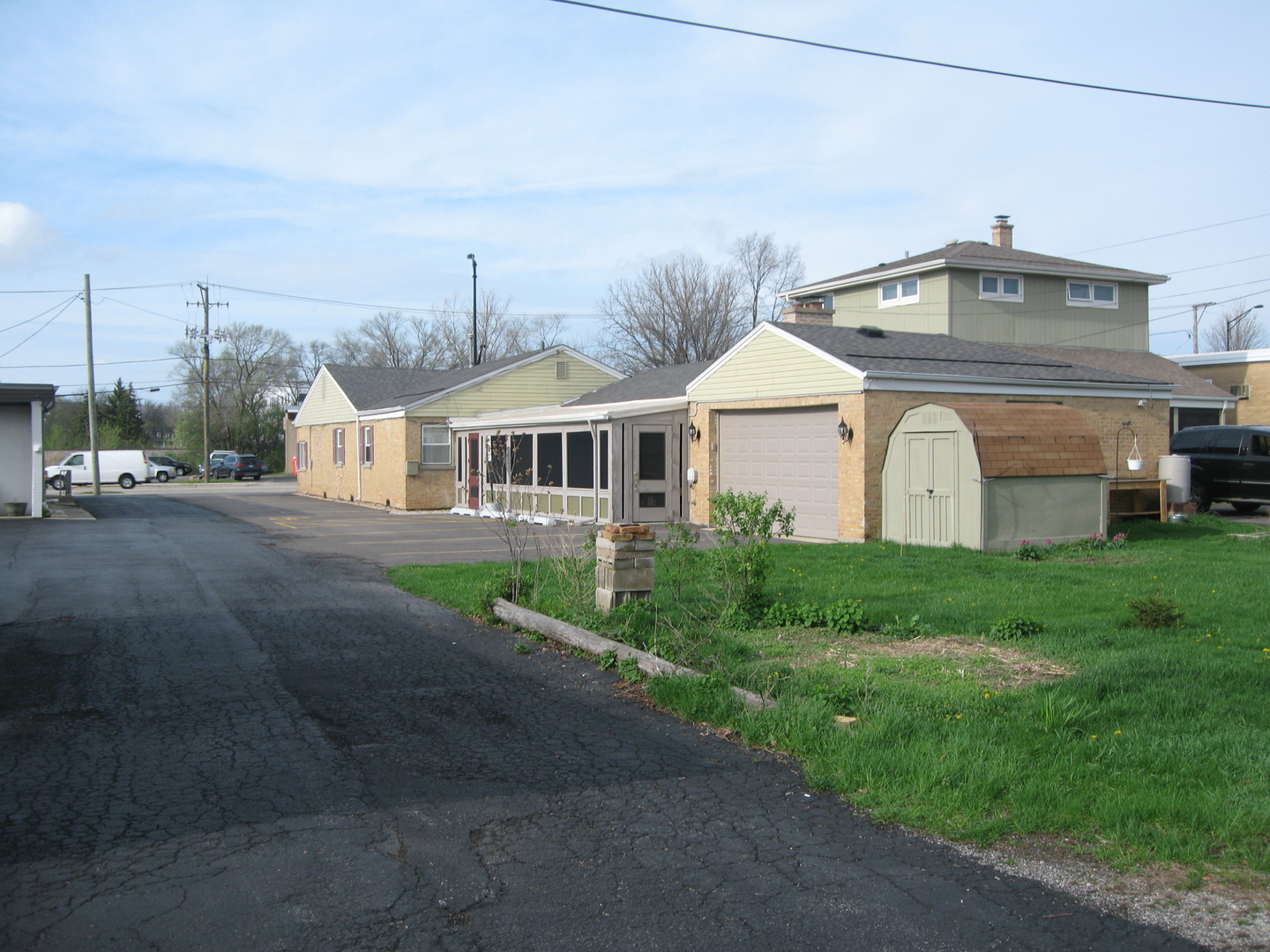 138 West Irving Park Road Wood Dale, IL 60191 - Photo 46 of 63 a front view of a house with a garden