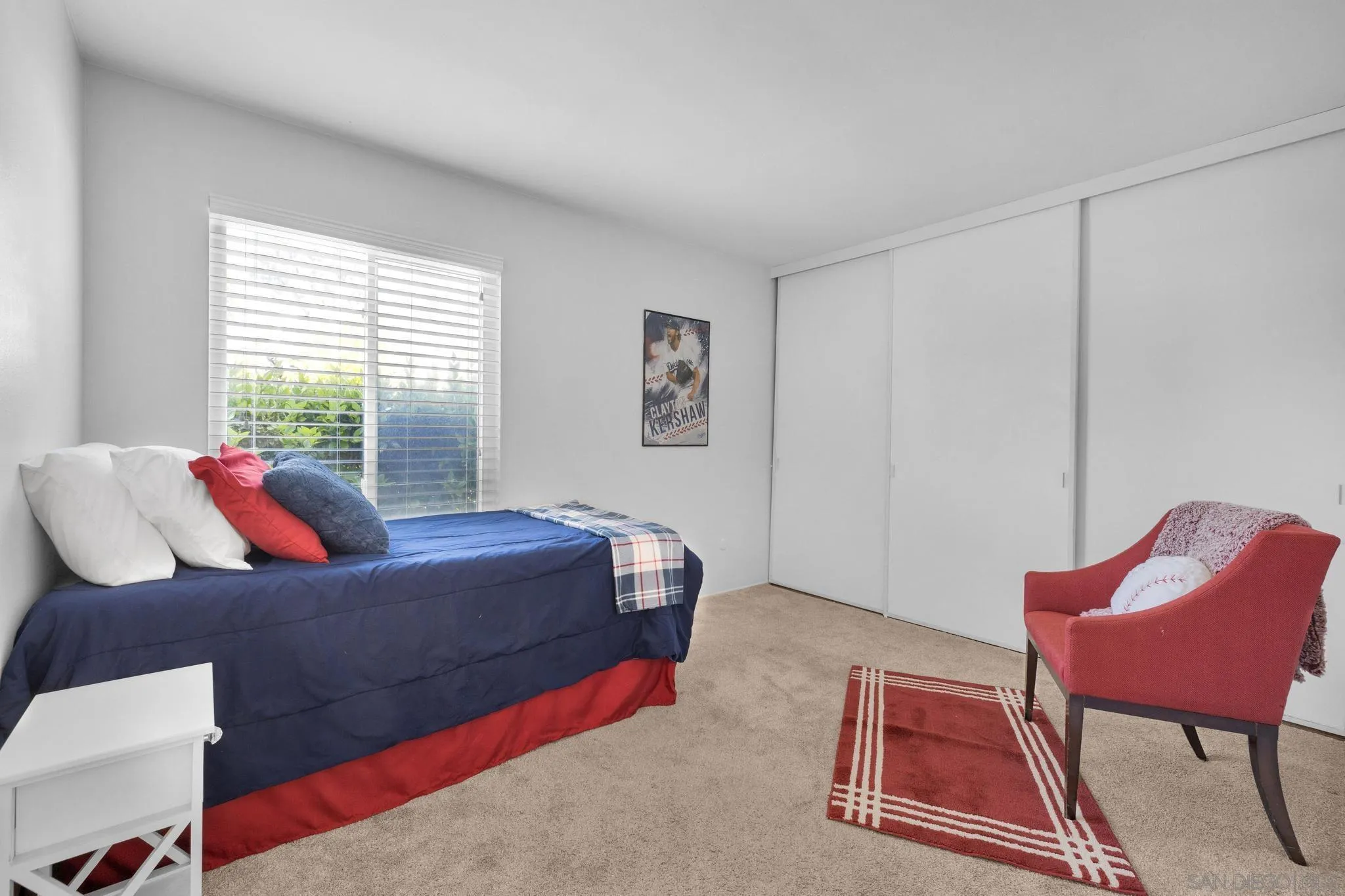 1841 Gatepost Road Encinitas, CA 92024 - Photo 12 of 30 a living room with furniture a red couch and a window