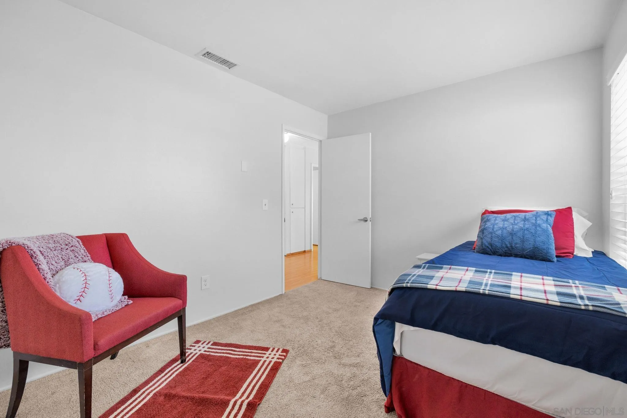 1841 Gatepost Road Encinitas, CA 92024 - Photo 13 of 30 a bedroom with a bed and chair