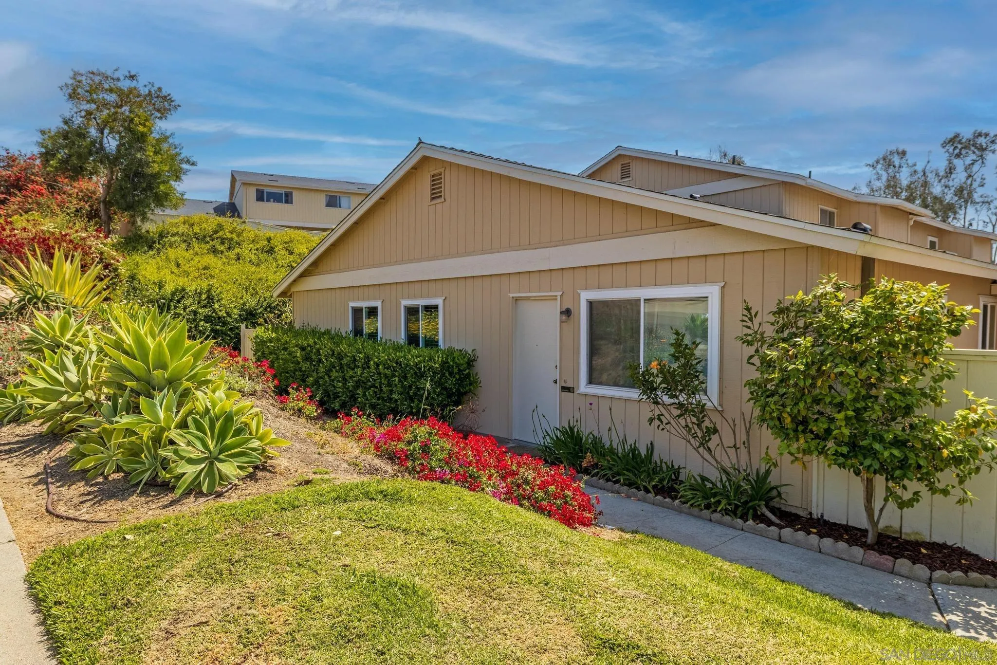 1841 Gatepost Road Encinitas, CA 92024 - Photo 2 of 30 a front view of a house with a yard