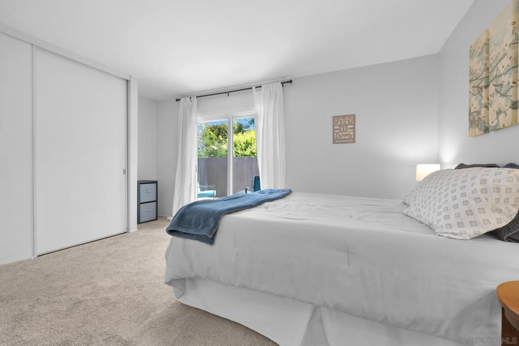 1841 Gatepost Road Encinitas, CA 92024 - Photo 21 of 30 a bedroom with a bed and a window