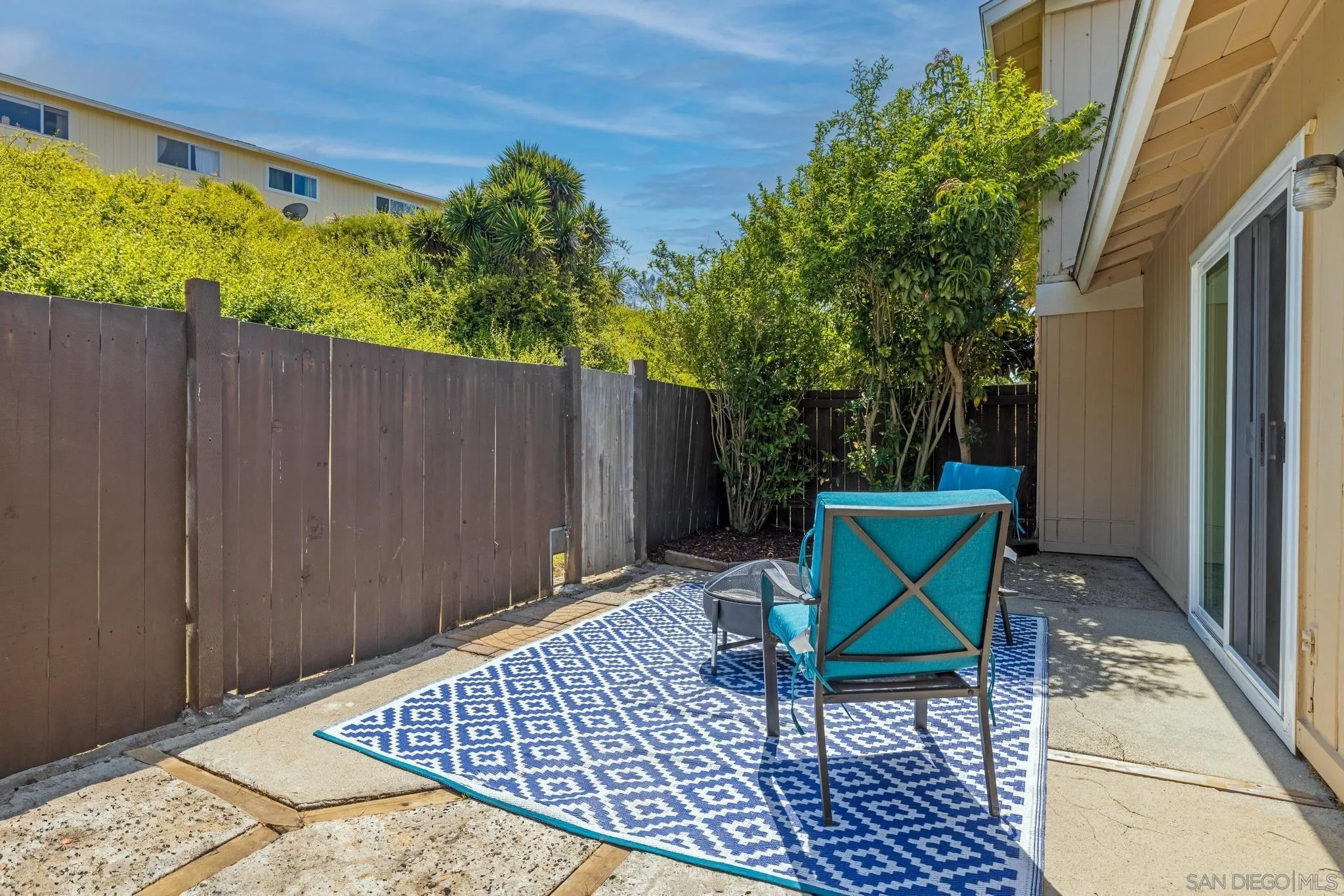 1841 Gatepost Road Encinitas, CA 92024 - Photo 23 of 30 a backyard of a house with table and chairs