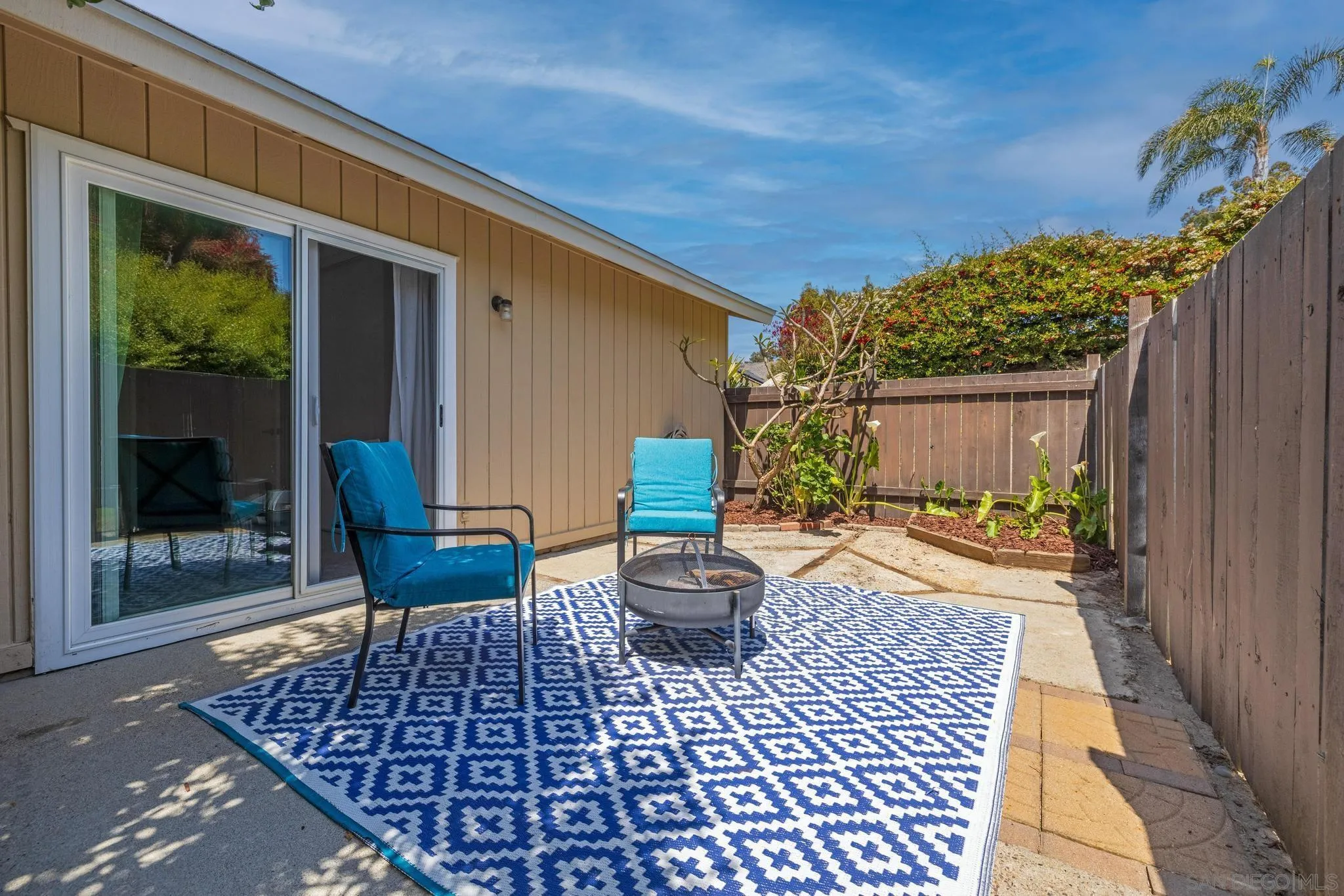 1841 Gatepost Road Encinitas, CA 92024 - Photo 25 of 30 a view of a chair and tables in the patio
