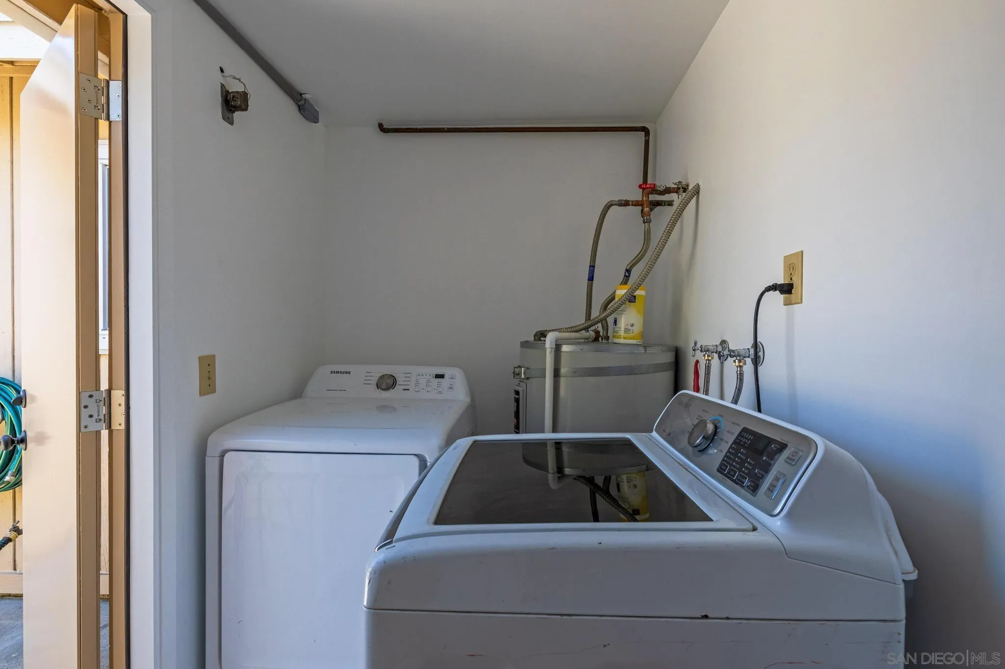 1841 Gatepost Road Encinitas, CA 92024 - Photo 28 of 30 a utility room with dryer and washer
