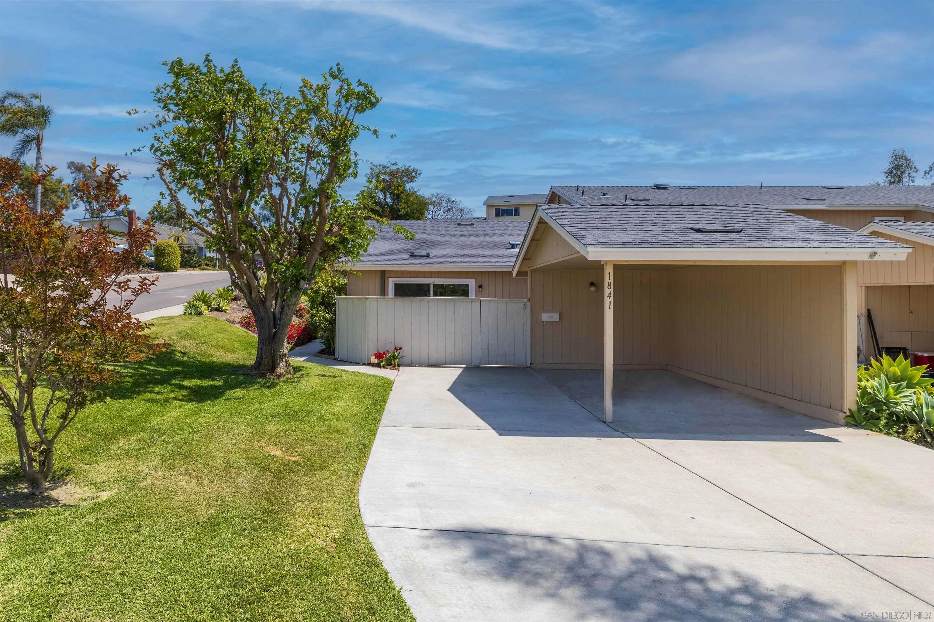 1841 Gatepost Road Encinitas, CA 92024 - Photo 29 of 30 a front view of a house with a yard and garage