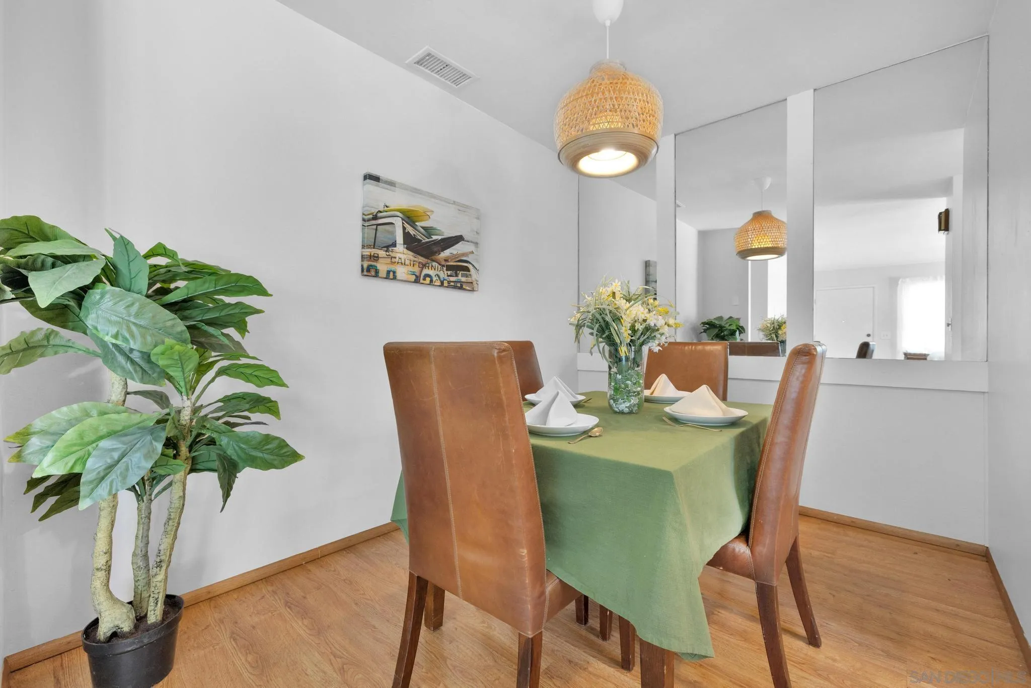 1841 Gatepost Road Encinitas, CA 92024 - Photo 8 of 30 a dining room with furniture and wooden floor
