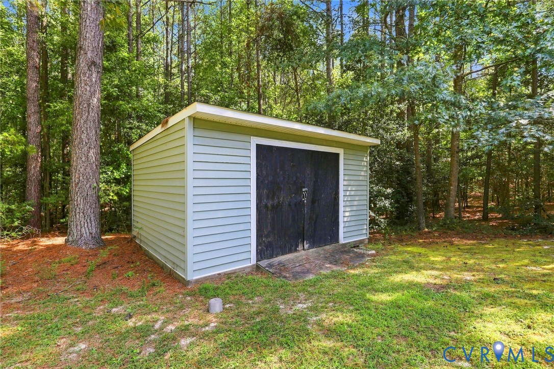 16753 Jolly Road Disputanta, VA 23842 - Photo 44 of 44 Detached storage shed featuring horizontal siding