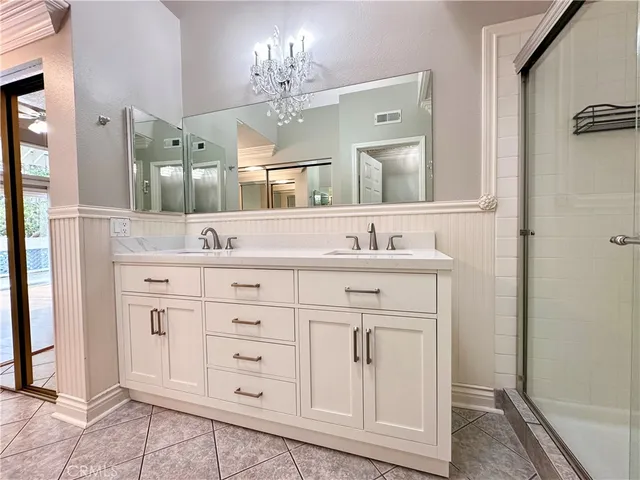 a kitchen with a sink and a refrigerator