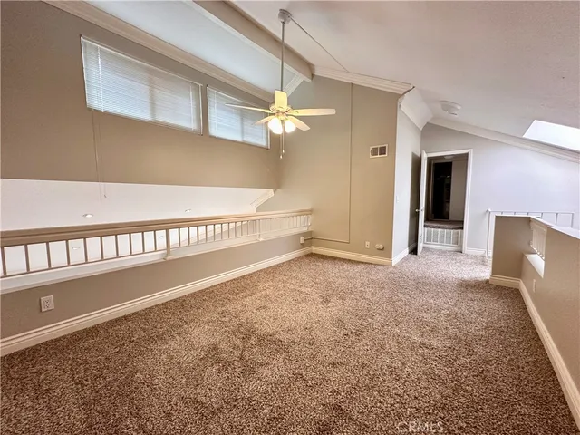 a kitchen with a stove window and refrigerator