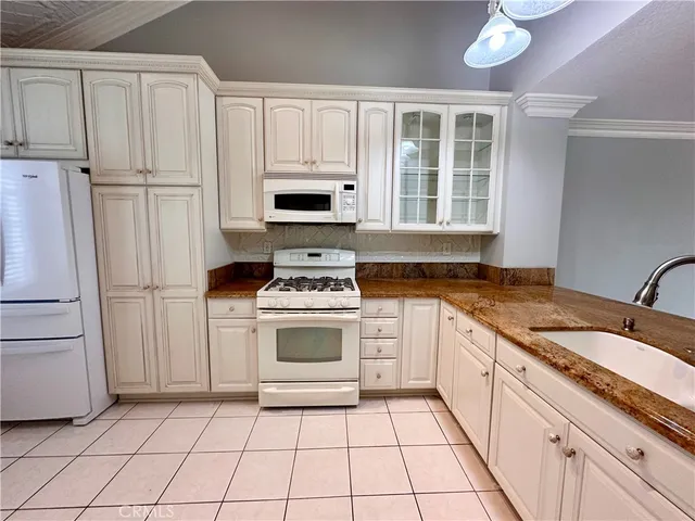 a view of a house with a street