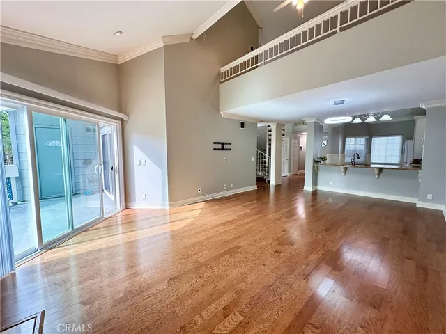 a bathroom with a glass door shower a sink and a mirror