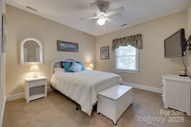 a view of a livingroom with workspace and a couch