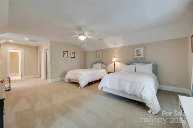 a bathroom with a sink a vanity and a mirror