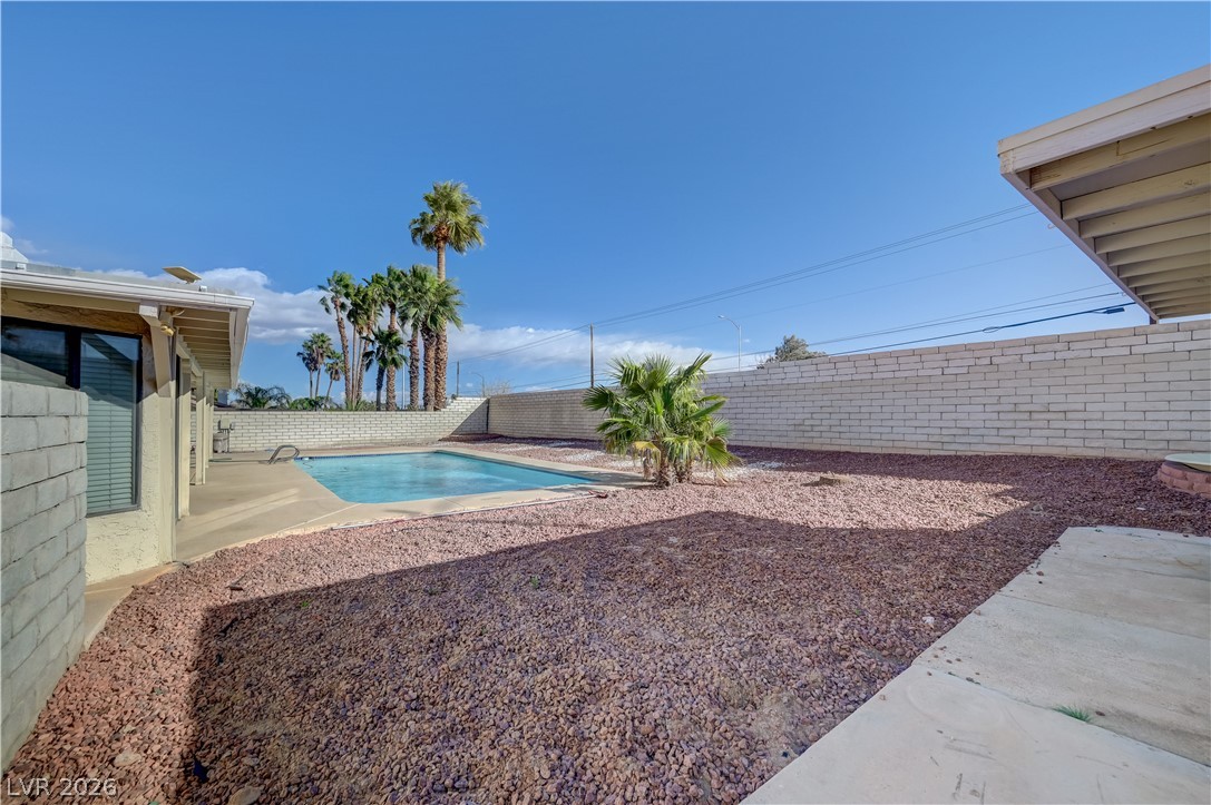 6635 Costa Brava Road Las Vegas, NV 89146 - Photo 57 of 59 An inviting pool and rock landscaping create a desert oasis.