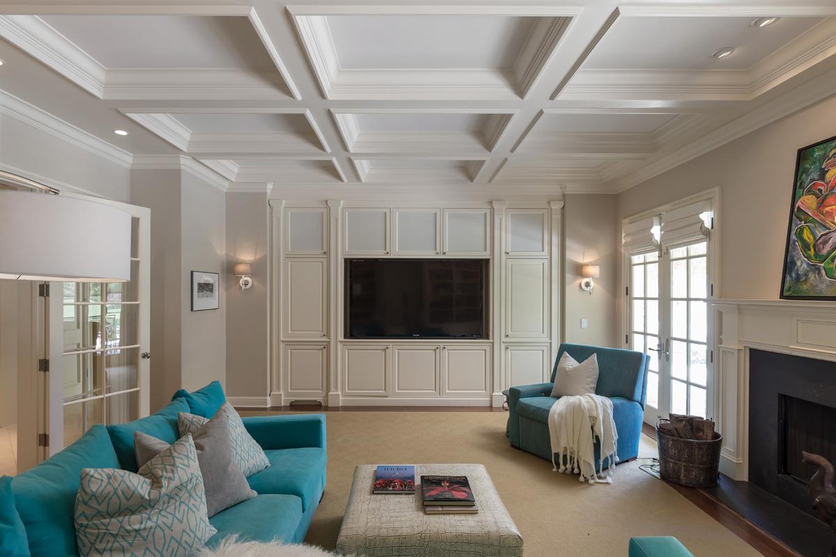 87 Patricia Drive Atherton, CA 94027 - Photo 15 of 41 a living room with furniture a flat screen tv and a fireplace