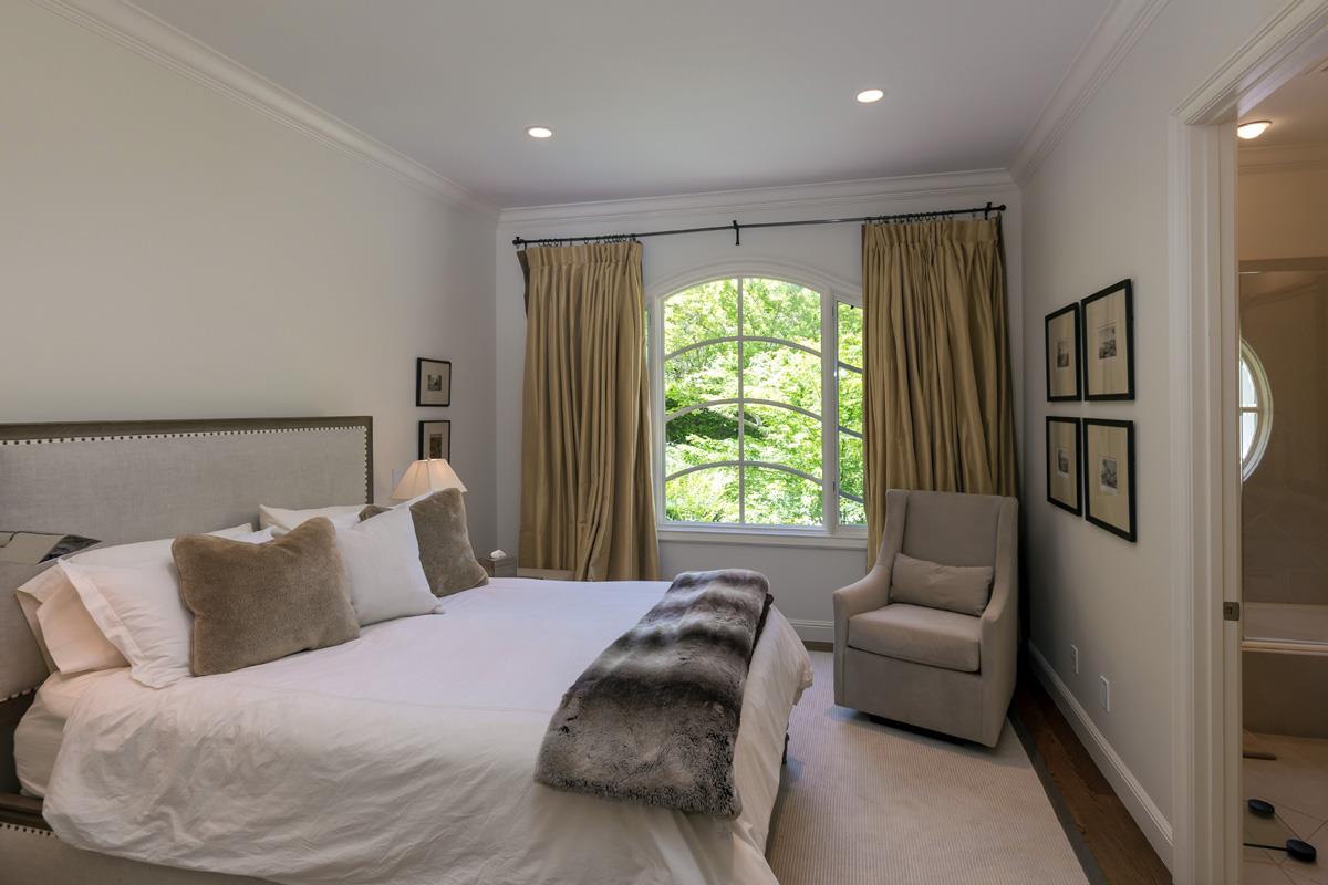 87 Patricia Drive Atherton, CA 94027 - Photo 17 of 41 a bedroom with a bed and a couch