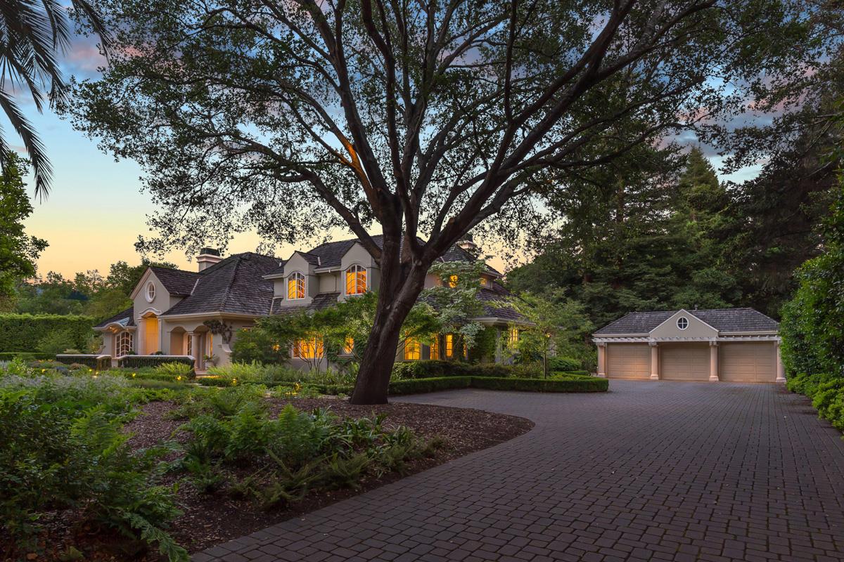 87 Patricia Drive Atherton, CA 94027 - Photo 2 of 41 a front view of a house with trees and yard
