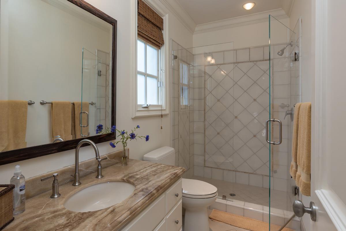 87 Patricia Drive Atherton, CA 94027 - Photo 22 of 41 a bathroom with a granite countertop sink toilet and shower