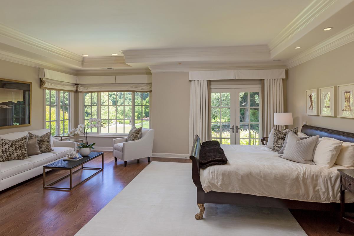 87 Patricia Drive Atherton, CA 94027 - Photo 27 of 41 a bedroom with a bed couch and a large window