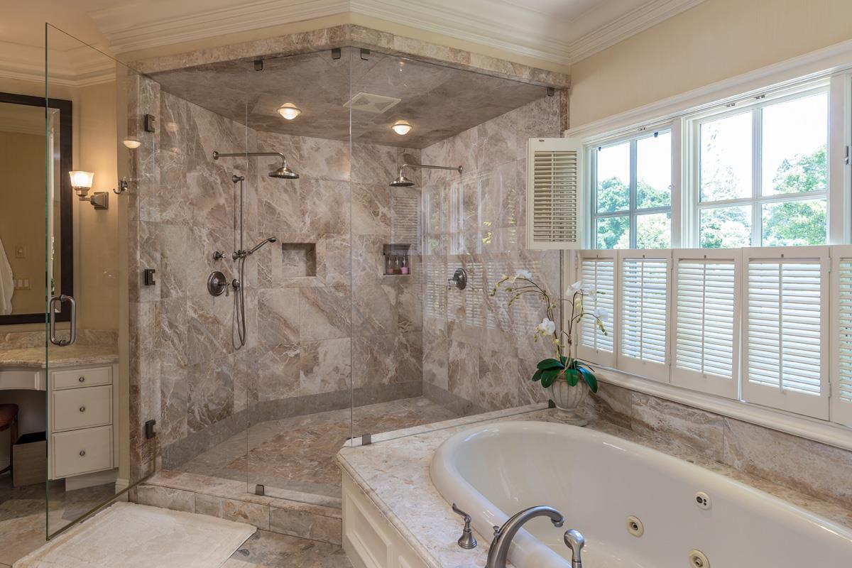 87 Patricia Drive Atherton, CA 94027 - Photo 30 of 41 a bathroom with a tub a sink and a shower