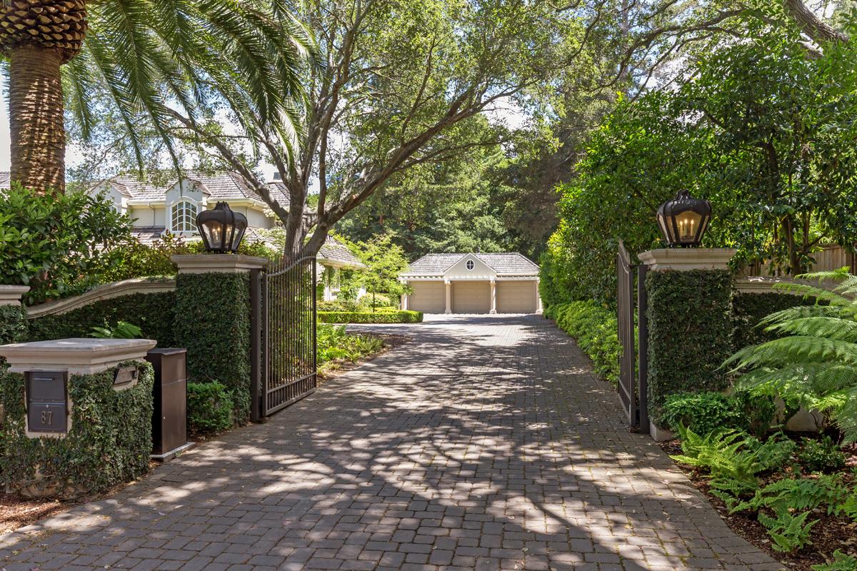 87 Patricia Drive Atherton, CA 94027 - Photo 3 of 41 a front view of a house with a yard and tree s