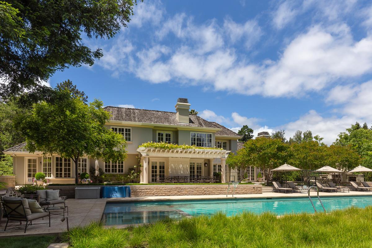 87 Patricia Drive Atherton, CA 94027 - Photo 32 of 41 a front view of a house with a yard table and chairs