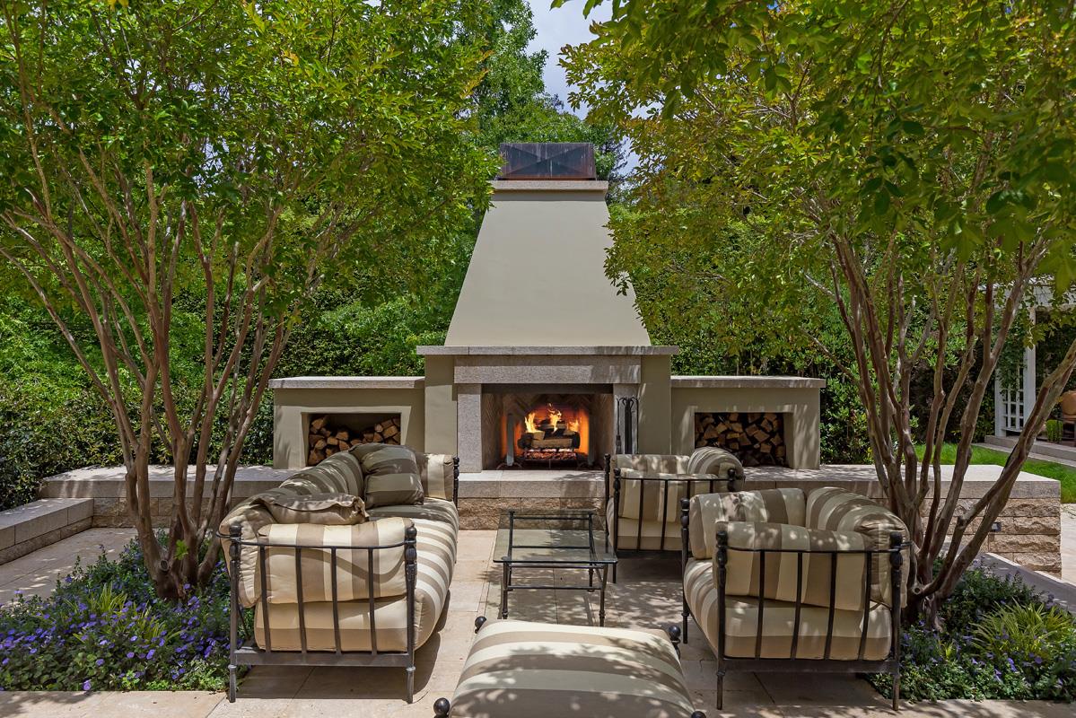 87 Patricia Drive Atherton, CA 94027 - Photo 33 of 41 a patio with couches table and chairs and potted plants