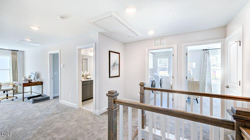 229 Tidal Pool Way Cary, NC 27519 - Photo 17 of 32 a view of a livingroom with furniture and a livingroom