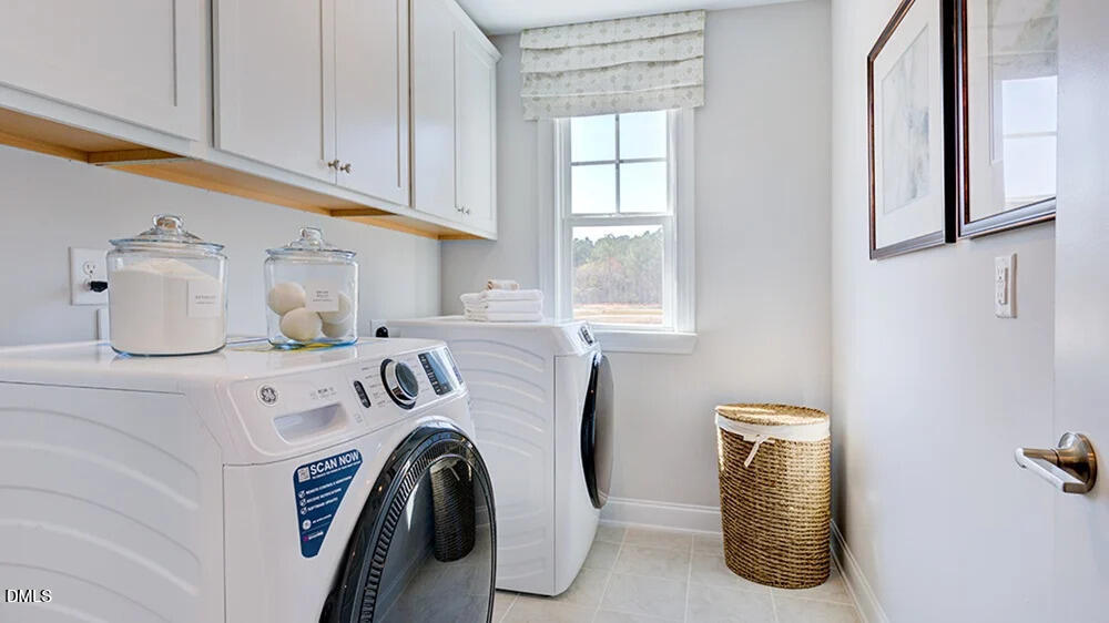 229 Tidal Pool Way Cary, NC 27519 - Photo 29 of 32 a utility room with dryer and washer