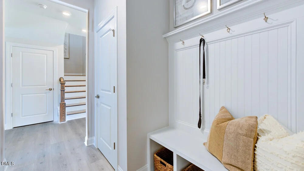 229 Tidal Pool Way Cary, NC 27519 - Photo 5 of 32 a view of a bedroom with furniture and wooden floor