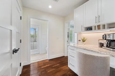 a kitchen with granite countertop a sink and a granite counter tops